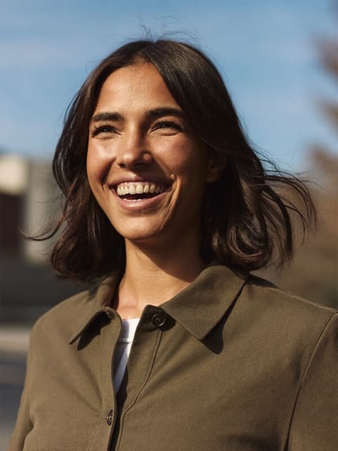 Portrait of Sofia, a platform engineer at Happydance who relocated from Spain